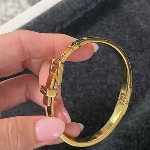 Michael Kors black and gold hard bangle bracelet